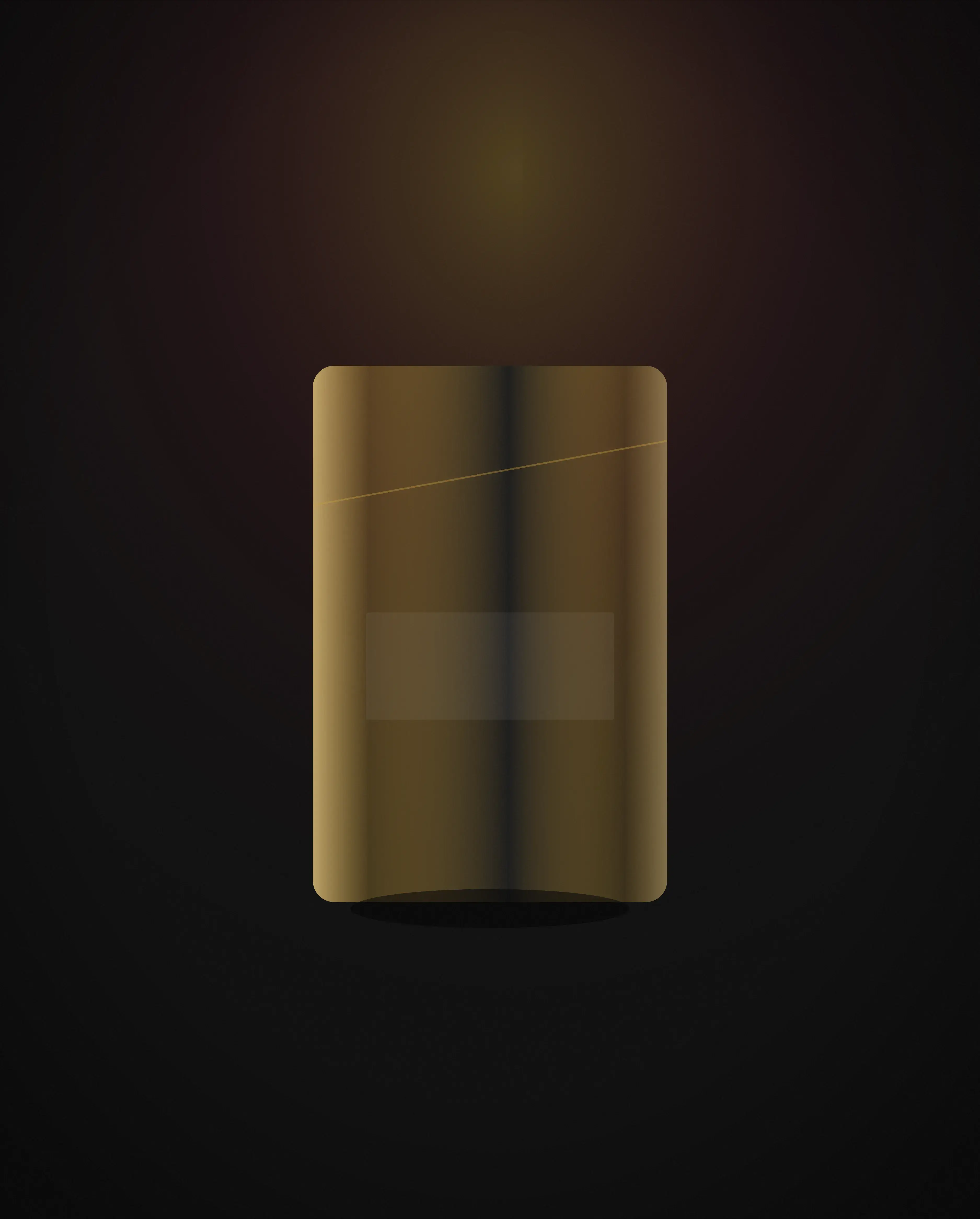 A cigarette pack photographed in low warm light on a dark background